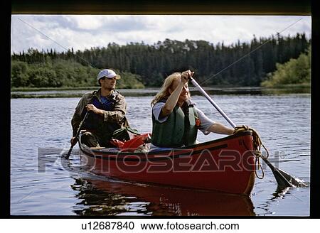Men canoeing View Large Photo Image Stock Image - Men canoeing. Fotosearch