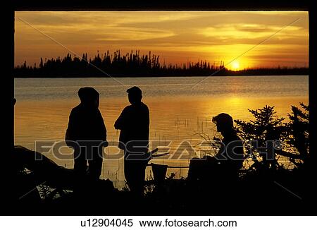 People on a shoreline View Large Photo Image Stock Photography - People on a shoreline. Fotosearch