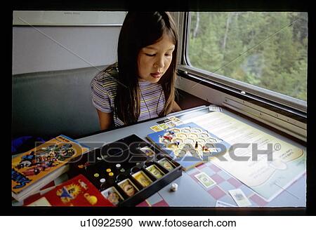 Playing a board game View Large Photo Image Stock Image - Playing a board game. Fotosearch
