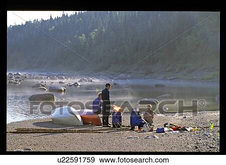 Stock Photo - Resting on beach. Fotosearch
