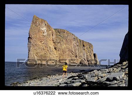 Stock Image - Rock in the ocean . Fotosearch