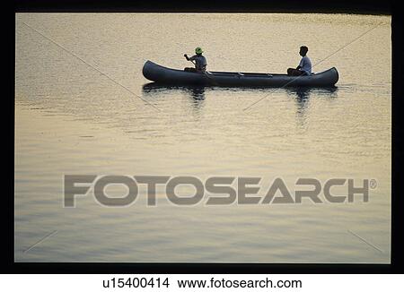 Picture - Rowing on a lake. Fotosearch