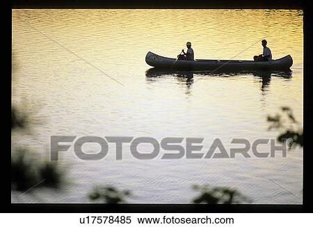 Stock Photography - Rowing on a lake. Fotosearch