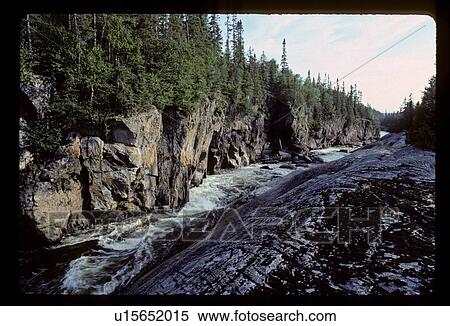 Rushing river with cliffs View Large Photo Image Stock Photography - Rushing river with cliffs . Fotosearch