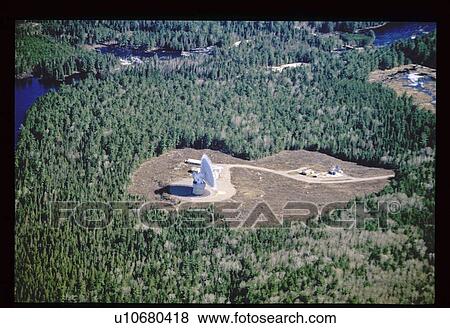Stock Photo - Satellite dish in clearing. Fotosearch
