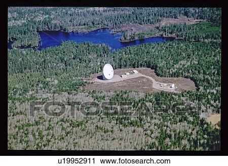 Satellite dish in forest clearing View Large Photo Image Stock Image - Satellite dish in forest clearing. Fotosearch