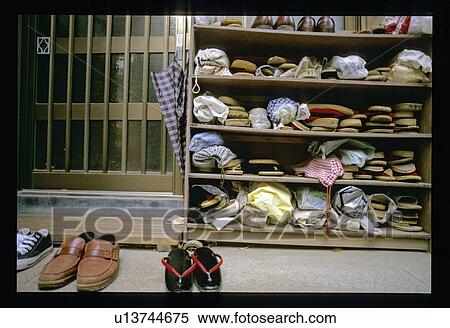 Stock Photography - Shoes outside a door. Fotosearch
