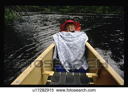Sleeping in a canoe View Large Photo Image Stock Photography - Sleeping in a canoe. Fotosearch