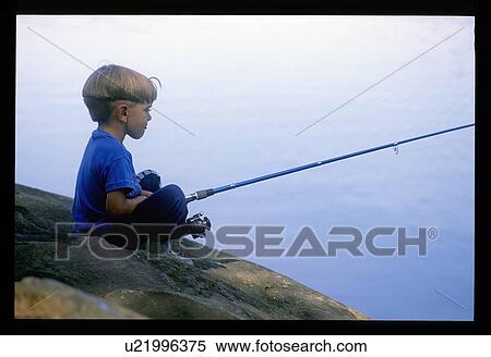 Small boy fishing View Large Photo Image Stock Photography - Small boy fishing. Fotosearch