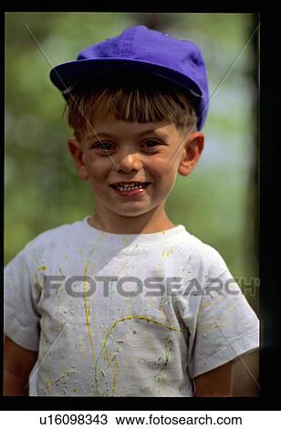 Smiling young boy View Large Photo Image Stock Image - Smiling young boy. Fotosearch