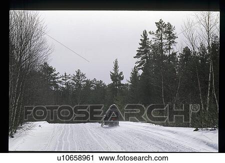 Stock Image - Snowmobiling. Fotosearch