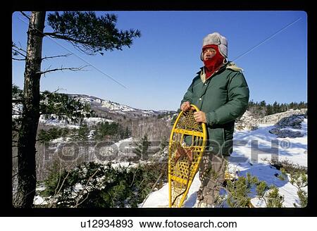 Snowshoe hiking View Large Photo Image Stock Image - Snowshoe hiking. Fotosearch