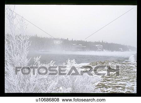 Stock Photo - Snowy shoreline . Fotosearch