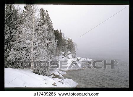 Stock Photography - Snowy shoreline. Fotosearch