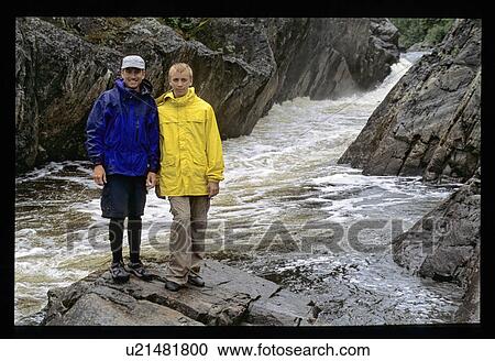 Standing in front of a river View Large Photo Image Stock Image - Standing in front of a river. Fotosearch