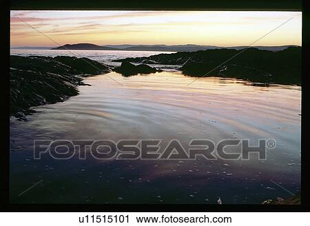 Sunset on the water View Large Photo Image Stock Image - Sunset on the water. Fotosearch