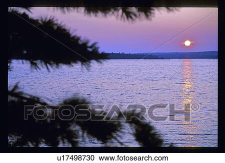 Sunset over water View Large Photo Image Stock Image - Sunset over water. Fotosearch