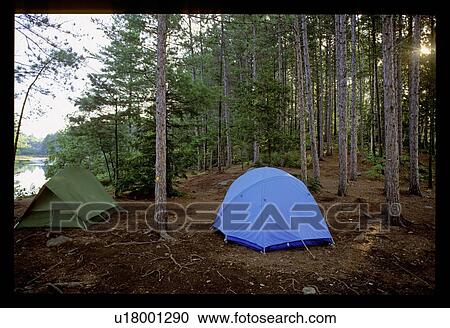 Stock Image - Tent camping. Fotosearch