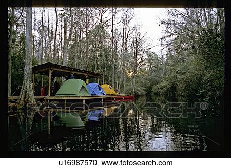 Tents on a pier View Large Photo Image Stock Image - Tents on a pier. Fotosearch