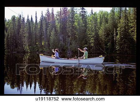 Stock Image - Two canoers. Fotosearch