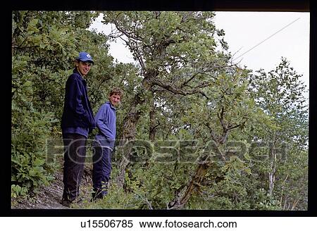 Two teen boys on nature path View Large Photo Image Stock Photography - Two teen boys on nature path. Fotosearch
