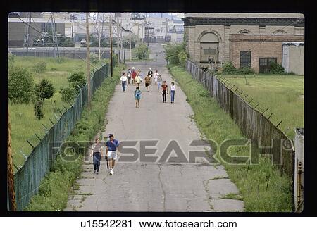 Walking in the city View Large Photo Image Stock Image - Walking in the city. Fotosearch
