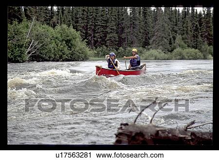 Stock Image - Whitewater rafting. Fotosearch