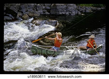 Stock Image - Whitewater rafting. Fotosearch
