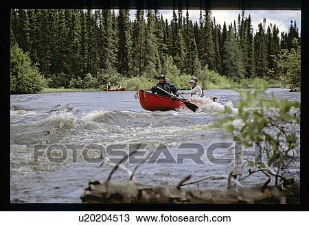 Stock Image - Whitewater rafting . Fotosearch