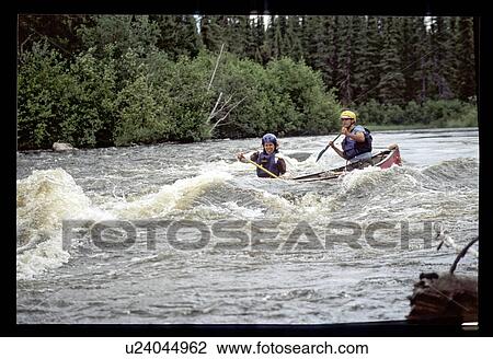 Stock Image - Whitewater rafting. Fotosearch