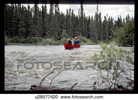Stock Image - Whitewater rafting. Fotosearch