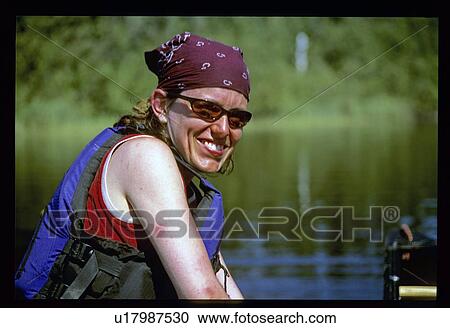 Woman canoeing View Large Photo Image Stock Image - Woman canoeing . Fotosearch