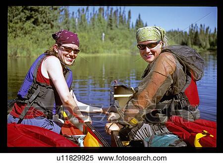 Woman canoeing View Large Photo Image Stock Photography - Woman canoeing . Fotosearch