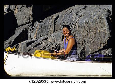 Woman canoeing View Large Photo Image Stock Photography - Woman canoeing. Fotosearch
