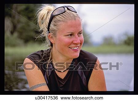 Woman in a canoe View Large Photo Image Stock Photograph - Woman in a canoe . Fotosearch