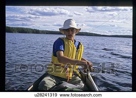 Young canoer View Large Photo Image Stock Photo - Young canoer. Fotosearch
