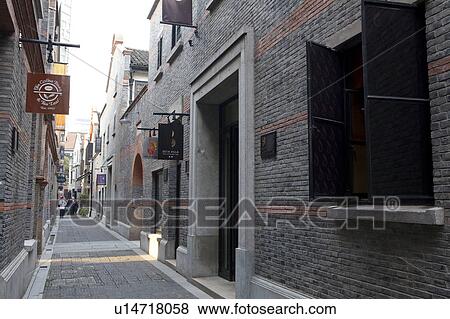 Alley Through Brick Buildings View Large Photo Image Stock Photo - Alley Through Brick Buildings. Fotosearch