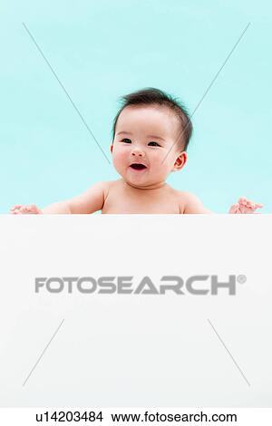 Picture - Baby Boy Holding Blank Message. Fotosearch