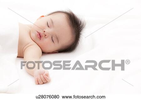 Stock Image - Baby Boy Sleeping. Fotosearch