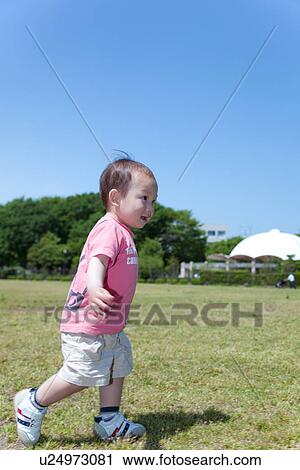 Baby Boy Walking in Park View Large Photo Image Stock Image - Baby Boy Walking in Park. Fotosearch