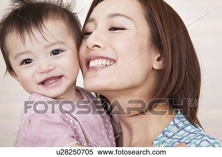 Stock Photography - Baby Girl and Mother. Fotosearch