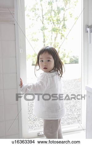 Baby Girl at Doorway View Large Photo Image Picture - Baby Girl at Doorway. Fotosearch