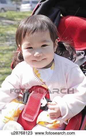 Baby Girl in Buggy View Large Photo Image Stock Image - Baby Girl in Buggy. Fotosearch