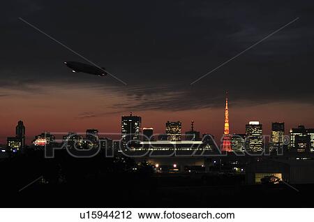 Stock Image - Blimb Over Tokyo. Fotosearch