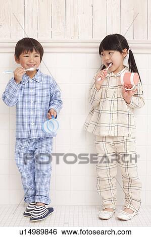 Boy and Girl Burshing Teeth View Large Photo Image Stock Photograph - Boy and Girl Burshing Teeth. Fotosearch