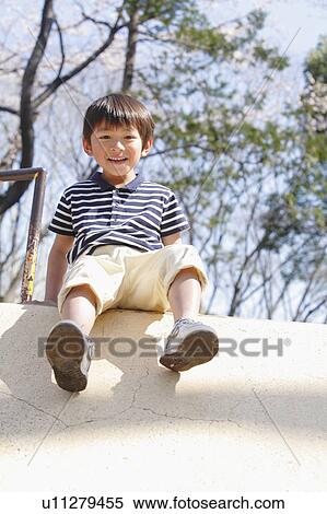 Boy at Playground View Large Photo Image Stock Photography - Boy at Playground. Fotosearch