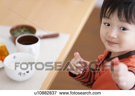 Boy Having Breakfast View Large Photo Image Stock Photo - Boy Having Breakfast. Fotosearch
