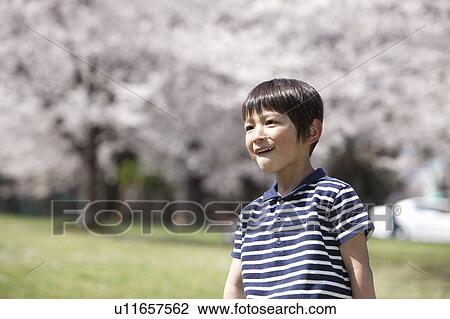 Stock Image - Boy in Park. Fotosearch