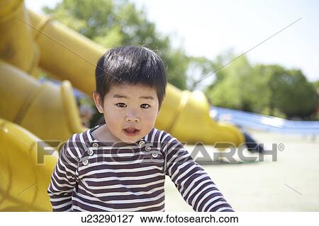 Boy in Playground View Large Photo Image Stock Photo - Boy in Playground. Fotosearch