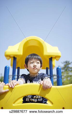 Boy in Playground View Large Photo Image Stock Photo - Boy in Playground. Fotosearch
